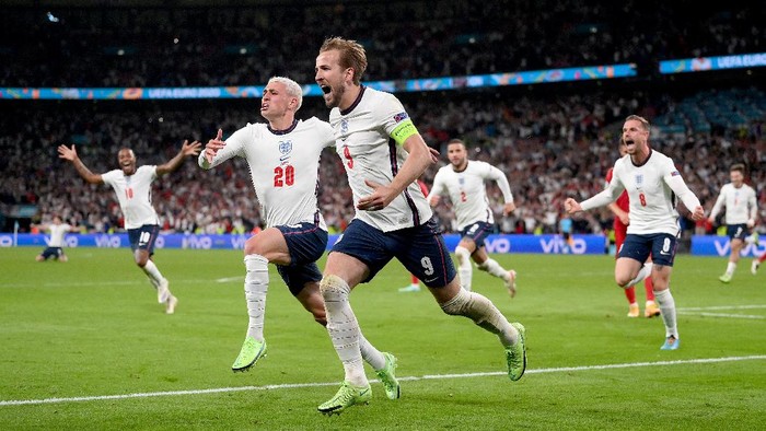 LONDON, ENGLAND - JULY 07: Harry Kane of England celebrates after scoring their sides second goal during the UEFA Euro 2020 Championship Semi-final match between England and Denmark at Wembley Stadium on July 07, 2021 in London, England. (Photo by Laurence Griffiths/Getty Images)