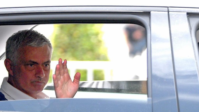 Portuguese football coach Jose Mourinho waves from a car after his official presentation as Roma coach in central Rome on July 8, 2021.