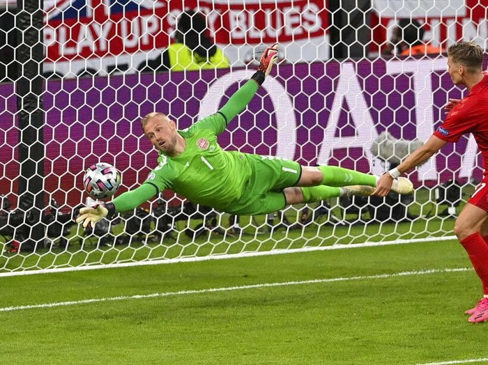 England's Harry Kane, right, reacts after scoring his team's second goal during the Euro 2020 soccer championship semifinal between England and Denmark at Wembley stadium in London, Wednesday, July 7, 2021. (Justin Tallis/Pool Photo via AP)