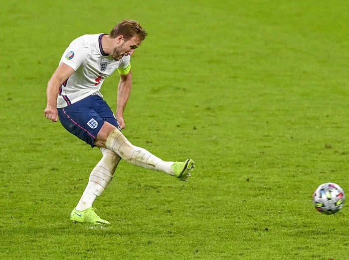 England's Harry Kane, right, reacts after scoring his team's second goal during the Euro 2020 soccer championship semifinal between England and Denmark at Wembley stadium in London, Wednesday, July 7, 2021. (Justin Tallis/Pool Photo via AP)