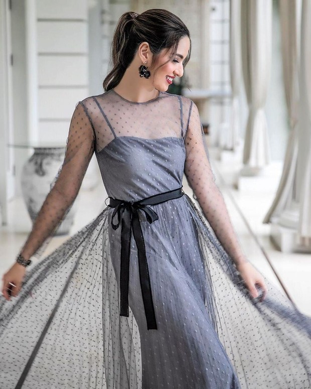 Nia Ramadhani dalam gaun Red Valentino