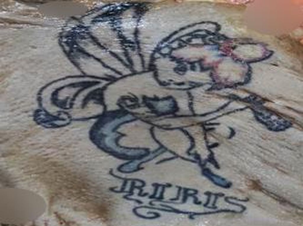 Penampakan Tato dan Ciri-ciri Lengkap Mayat Wanita Terbungkus Plastik Penampakan Tato dan Ciri-ciri Lengkap Mayat Wanita Terbungkus Plastik
