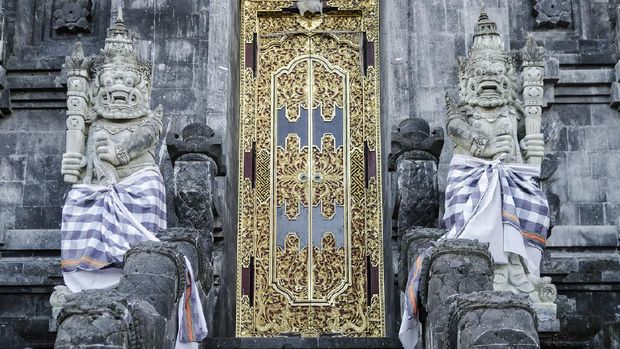 Pura Goa Lawah 'bat cave' ancient hindu temple exterior detail in klungkung south bali indonesia