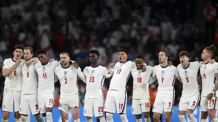 England players react during a penalty shootout at the end of the Euro 2020 soccer championship final match between England and Italy at Wembley stadium in London, Sunday, July 11, 2021. Italy defeated England 3-2 in a penalty shootout after the game ended in a 1-1 draw. (Carl Recine/Pool Photo via AP)