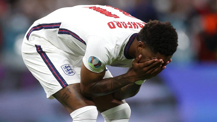 Englands Marcus Rashford reacts after failing to score a penalty during a shootout at the end of the Euro 2020 soccer championship final match between England and Italy at Wembley stadium in London, Sunday, July 11, 2021. Italy defeated England 3-2 in a penalty shootout after the game ended in a 1-1 draw. (Carl Recine/Pool Photo via AP)
