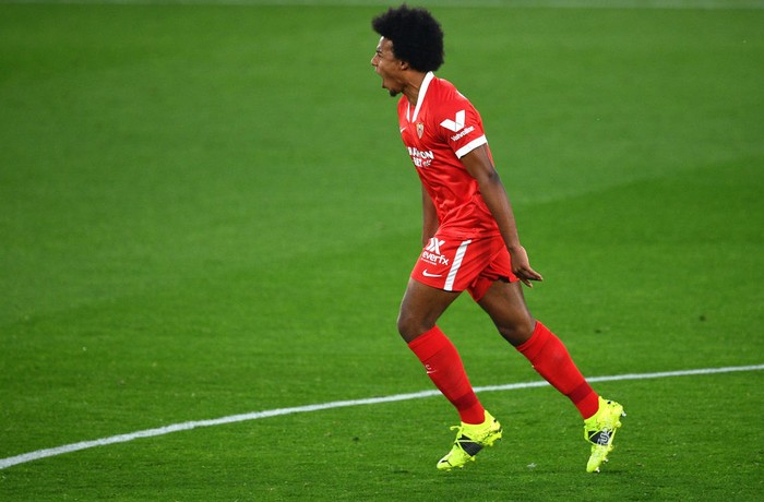 VIGO, SPAIN - APRIL 12: Jules Kounde of Sevilla celebrates after scoring their sides first goal  during the La Liga Santander match between RC Celta and Sevilla FC at Abanca-Balaídos on April 12, 2021 in Vigo, Spain. Sporting stadiums around Spain remain under strict restrictions due to the Coronavirus Pandemic as Government social distancing laws prohibit fans inside venues resulting in games being played behind closed doors.  (Photo by Octavio Passos/Getty Images)