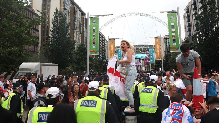 LONDON, ENGLAND - JULY 11: Police walk down Olympic Way during the UEFA Euro 2020 Championship Final between Italy and England at Wembley Stadium on July 11, 2021 in London, England. (Photo by Alex Pantling/Getty Images)