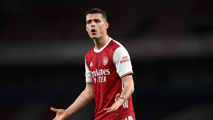 LONDON, ENGLAND - FEBRUARY 21:  Granit Xhaka of Arsenal reacts during the Premier League match between Arsenal and Manchester City at Emirates Stadium on February 21, 2021 in London, England. Sporting stadiums around the UK remain under strict restrictions due to the Coronavirus Pandemic as Government social distancing laws prohibit fans inside venues resulting in games being played behind closed doors. (Photo by Shaun Botterill/Getty Images)