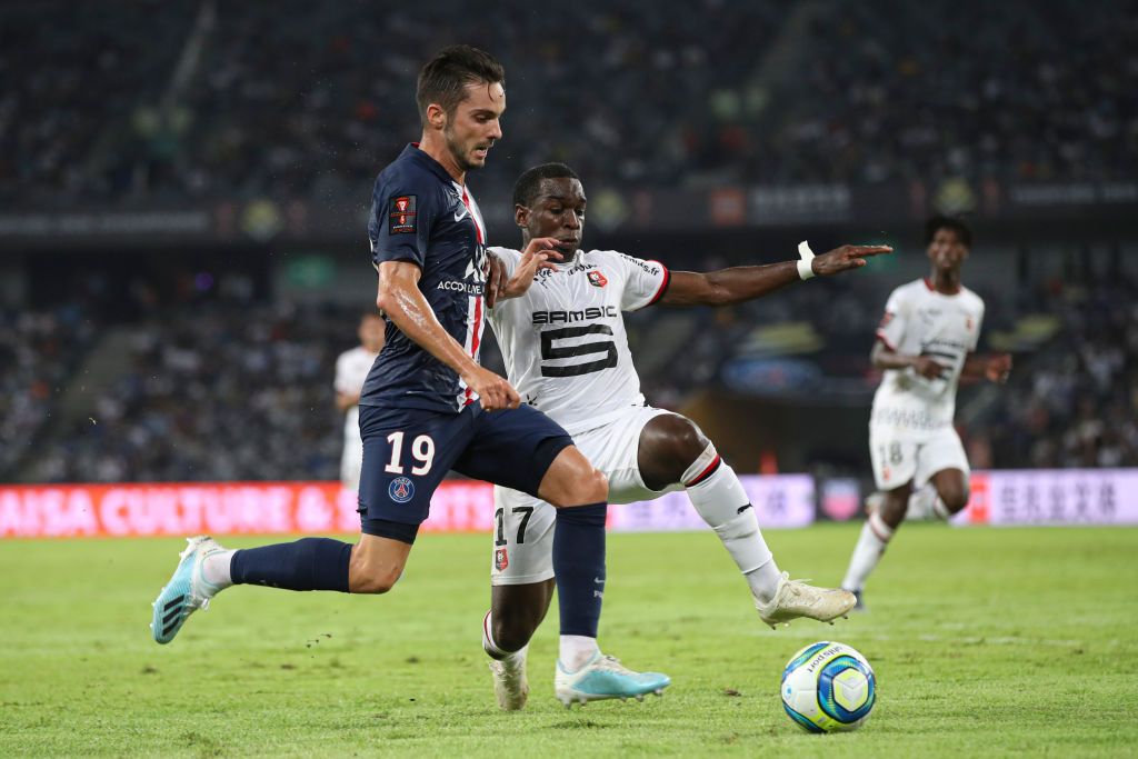 SHENZHEN, CHINA - AUGUST 03: Pablo Sarabia Garcia #19 of Paris Saint-Germain and Faitout Maouassa #17 of Stade Rennais FC challenging for the ball during the 2019 Trophee des Champions between Paris saint-Germain and Stade Rennais FC at Shenzhen Uniersiade Sports Center on August 3, 2019 in Shenzhen, China. (Photo by Lintao Zhang/Getty Images)