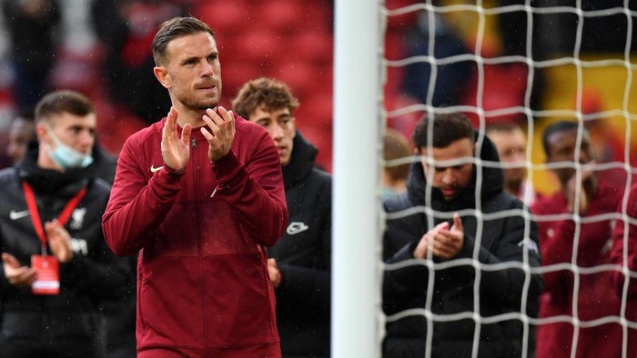 LIVERPOOL, ENGLAND - MAY 23: Jordan Henderson of Liverpool claps the fans following the Premier League match between Liverpool and Crystal Palace at Anfield on May 23, 2021 in Liverpool, England. A limited number of fans will be allowed into Premier League stadiums as Coronavirus restrictions begin to ease in the UK. (Photo by Paul Ellis - Pool/Getty Images)