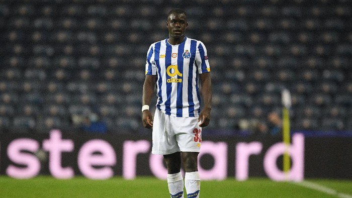 PORTO, PORTUGAL - DECEMBER 01: Malang Sarr of FC Porto in action during the UEFA Champions League Group C stage match between FC Porto and Manchester City at Estadio do Dragao on December 1, 2020 in Porto, Portugal. Sporting stadiums around Portugal remain under strict restrictions due to the Coronavirus Pandemic as Government social distancing laws prohibit fans inside venues resulting in games being played behind closed doors. (Photo by Octavio Passos/Getty Images)