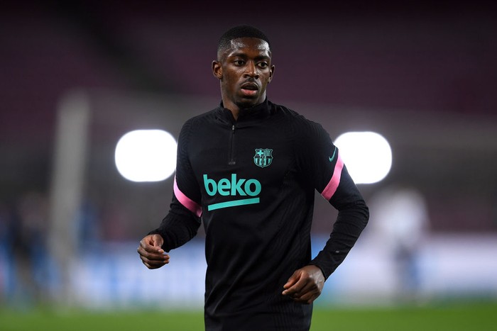 BARCELONA, SPAIN - FEBRUARY 16: Ousmane Dembele of FC Barcelona looks on during the warm up prior to the UEFA Champions League Round of 16 match between FC Barcelona and Paris Saint-Germain at Camp Nou on February 16, 2021 in Barcelona, Spain. Sporting stadiums around Spain remain under strict restrictions due to the Coronavirus Pandemic as Government social distancing laws prohibit fans inside venues resulting in games being played behind closed doors. (Photo by David Ramos/Getty Images)