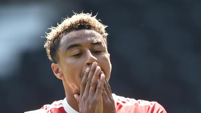 DERBY, ENGLAND - JULY 18: Jesse Lingard of Manchester United reacts during the pre-season friendly match between Derby County and Manchester United at Pride Park on July 18, 2021 in Derby, England. (Photo by Nathan Stirk/Getty Images)