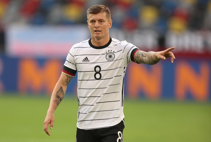 Toni Kroos DUESSELDORF, GERMANY - JUNE 07: Toni Kroos of Germany reacts during the international friendly match between Germany and Latvia at Merkur Spiel-Arena on June 07, 2021 in Duesseldorf, Germany. (Photo by Lars Baron/Getty Images)