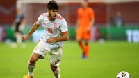 Beralih ke Timnas Spanyol, Marco Asensio dipanggil membela La Roja di Olimpiade Tokyo 2020. Asensio tampil sebanyak 48 kali bersama Real Madrid di musim 2020/2021 dengan tujuh gol dan dua assist sepanjang kampanye tersebut. Dean Mouhtaropoulos/Getty Images.  