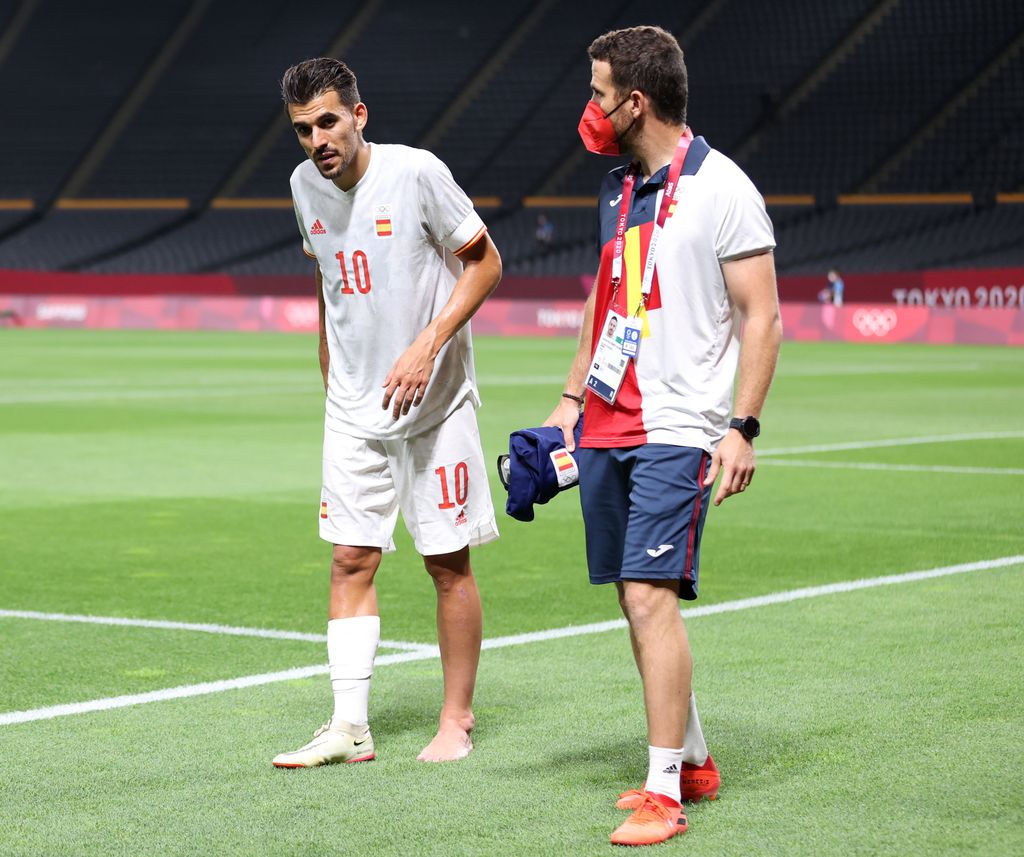 SAPPORO, JAPAN - JULY 22: Dani Ceballos #10 of Team Spain walks off injured during the Men's First Round Group C match between Egypt and Spain during the Tokyo 2020 Olympic Games at Sapporo Dome on July 22, 2021 in Sapporo, Hokkaido, Japan. (Photo by Masashi Hara/Getty Images)