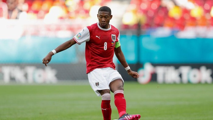 BUCHAREST, ROMANIA - JUNE 21: David Alaba of Austria makes a pass during the UEFA Euro 2020 Championship Group C match between Ukraine and Austria at National Arena on June 21, 2021 in Bucharest, Romania. (Photo by Robert Ghement - Pool/Getty Images)