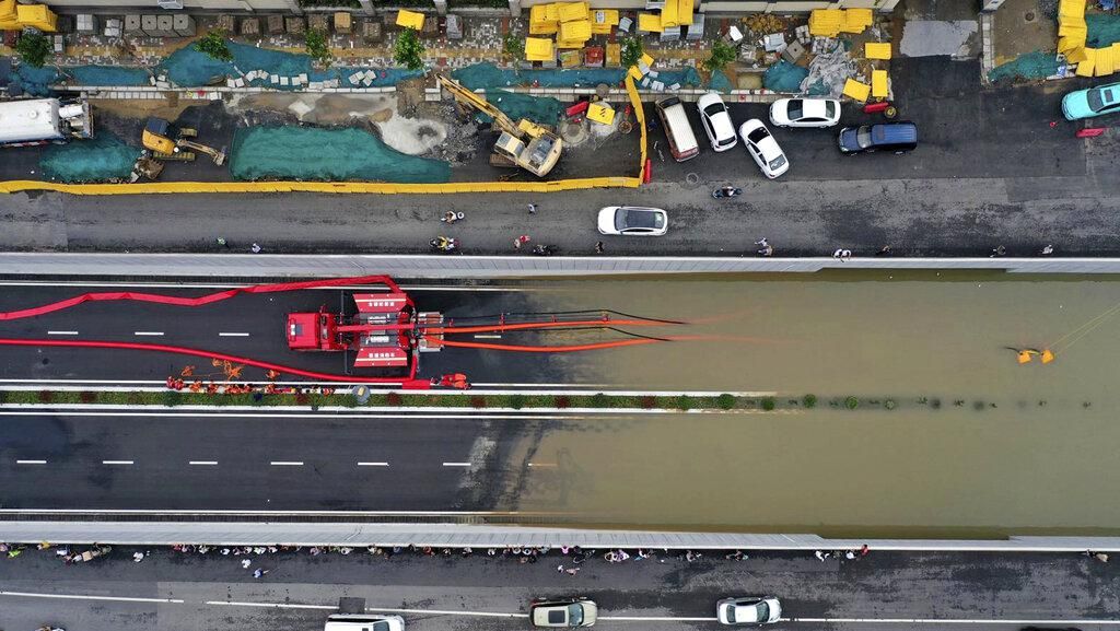 Foto: Infrastruktur Terendam Banjir, China Rugi 2,7 T