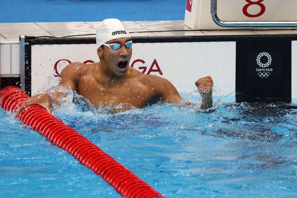 TOKYO, JAPAN - JULY 25: Ahmed Hafnaoui of Team Tunisia poses with the gold medal for the Men's 400m Freestyle Final on day two of the Tokyo 2020 Olympic Games at Tokyo Aquatics Centre on July 25, 2021 in Tokyo, Japan. (Photo by Al Bello/Getty Images)