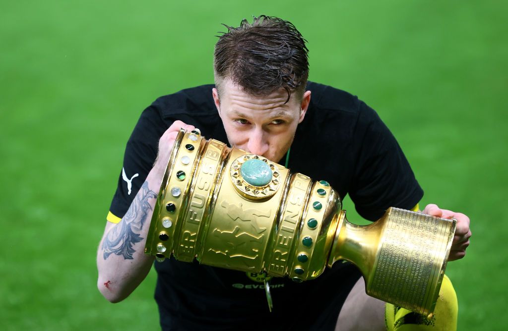 MANCHESTER, ENGLAND - APRIL 06: Marco Reus of Borussia Dortmund celebrates after scoring their team's first goal during the UEFA Champions League Quarter Final match between Manchester City and Borussia Dortmund at Etihad Stadium on April 06, 2021 in Manchester, England. Sporting stadiums around the UK remain under strict restrictions due to the Coronavirus Pandemic as Government social distancing laws prohibit fans inside venues resulting in games being played behind closed doors. (Photo by Clive Brunskill/Getty Images)