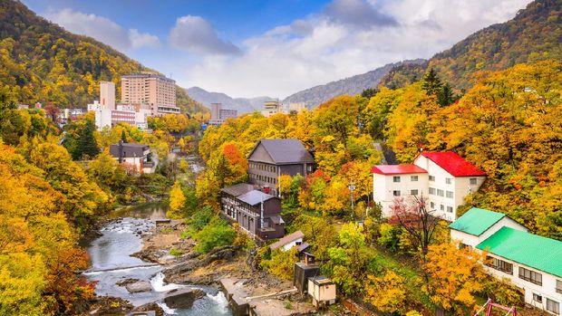 Jozankei Onsen Jozankei, Japan inns and river skyline during the autumn.