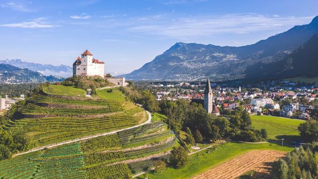 Balzers, Liechtenstein - September 2020: Burg Gutenberg, intact medieval castle and a church on a hilltop
