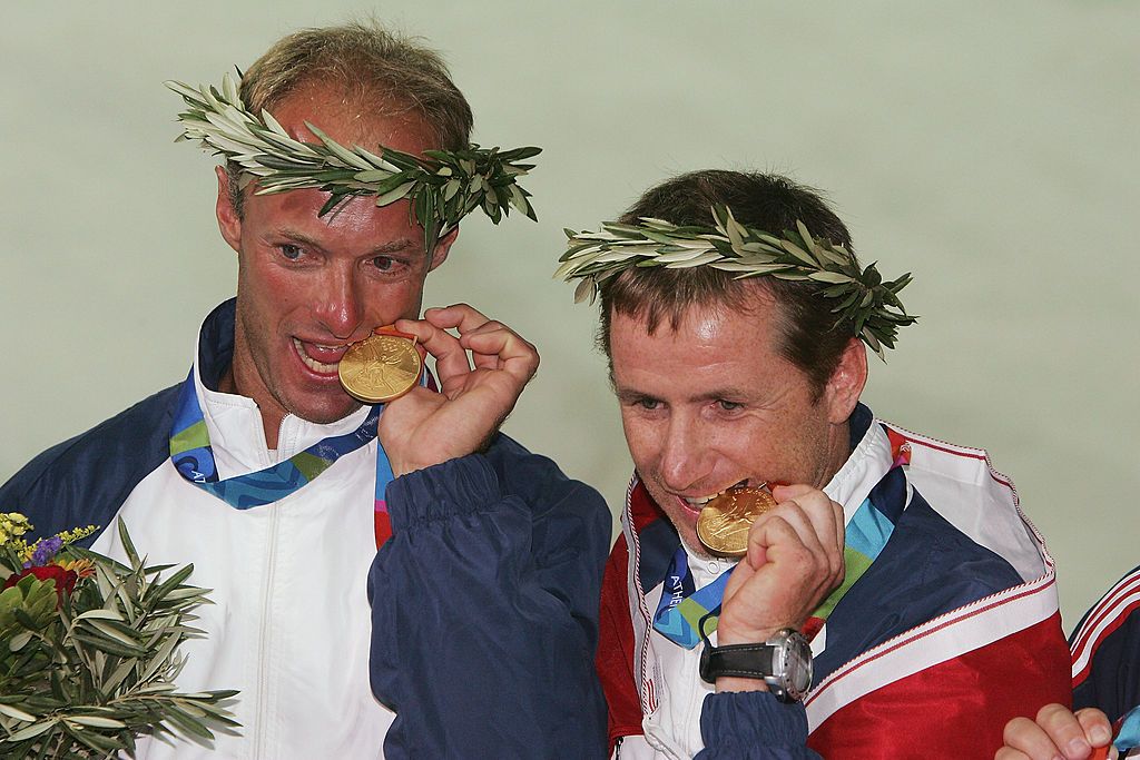 ATHENS - AUGUST 28:  Hans Peter Steinarcher (left) and Roman Hagara of Austria receive the gold medals for the open multihull tornado event on August 28, 2004 during the Athens 2004 Summer Olympic Games at Agios Kosmas Olympic Sailing Centre in Athens, Greece. (Photo by Ben Radford/Getty Images)