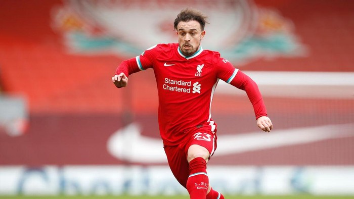 LIVERPOOL, ENGLAND - MARCH 07: Xherdan Shaqiri of Liverpool runs with the ball during the Premier League match between Liverpool and Fulham at Anfield on March 07, 2021 in Liverpool, England. Sporting stadiums around the UK remain under strict restrictions due to the Coronavirus Pandemic as Government social distancing laws prohibit fans inside venues resulting in games being played behind closed doors. (Photo by Phil Noble - Pool/Getty Images)