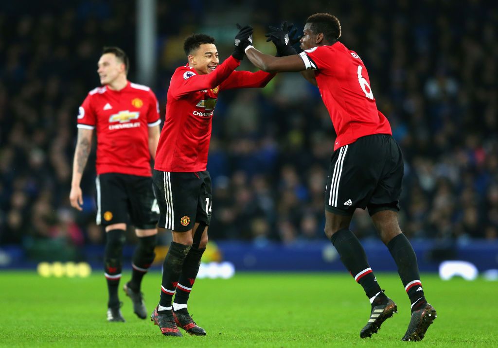 MANCHESTER, ENGLAND - SEPTEMBER 24: Paul Pogba of Manchester United (L) celebrates scoring his sides fourth goal with Jesse Lingard of Manchester United (R) during the Premier League match between Manchester United and Leicester City at Old Trafford on September 24, 2016 in Manchester, England.  (Photo by Clive Brunskill/Getty Images)