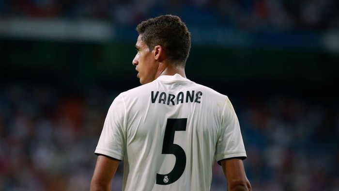 MADRID, SPAIN - AUGUST 11: Raphael Varane of Real Madrid CF in action during the Santiago Bernabeu Trophy between Real Madrid CF and AC Milan at Estadio Santiago Bernabeu on August 11, 2018 in Madrid, Spain. (Photo by Gonzalo Arroyo Moreno/Getty Images)
