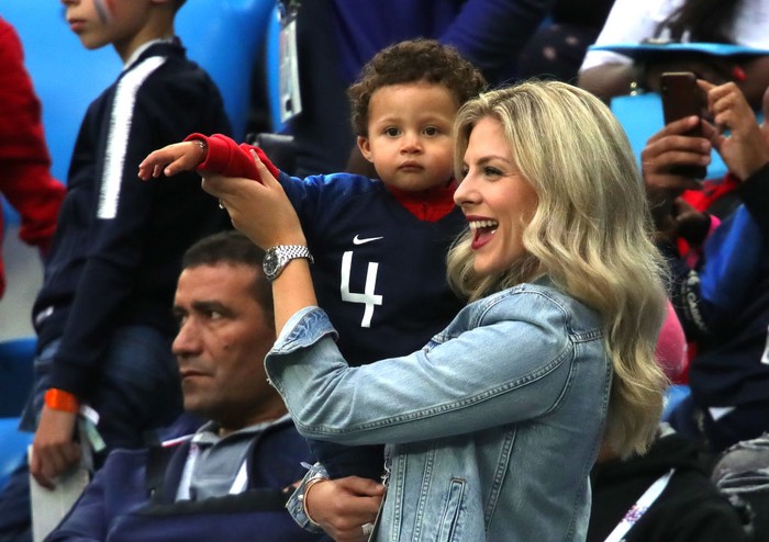 SAINT PETERSBURG, RUSSIA - JULY 10:  Raphael Varanes wife Camille Tytgat and son Ruben attend the 2018 FIFA World Cup Russia Semi Final match between Belgium and France at Saint Petersburg Stadium on July 10, 2018 in Saint Petersburg, Russia.  (Photo by Alexander Hassenstein/Getty Images)