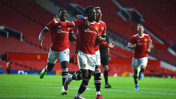 MANCHESTER, ENGLAND - JULY 28: Anthony Elanga of Manchester United celebrates after scoring their first goal during the pre-season friendly match between Manchester United and Brentford at Old Trafford on July 28, 2021 in Manchester, England. (Photo by Nathan Stirk/Getty Images)
