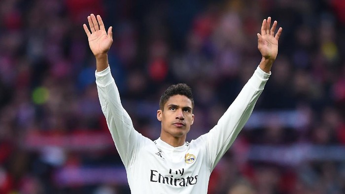MADRID, SPAIN - FEBRUARY 09:  Raphael Varane of Real Madrid celebrates after the La Liga match between Club Atletico de Madrid and Real Madrid CF at Wanda Metropolitano on February 09, 2019 in Madrid, Spain. (Photo by Denis Doyle/Getty Images)