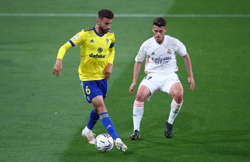 MADRID, SPAIN - MAY 22: Miguel Gutierrez of Real Madrid on the ball during the La Liga Santander match between Real Madrid and Villarreal CF at Estadio Santiago Bernabeu on May 22, 2021 in Madrid, Spain. Sporting stadiums around Spain remain under strict restrictions due to the Coronavirus Pandemic as Government social distancing laws prohibit fans inside venues resulting in games being played behind closed doors (Photo by Denis Doyle/Getty Images)