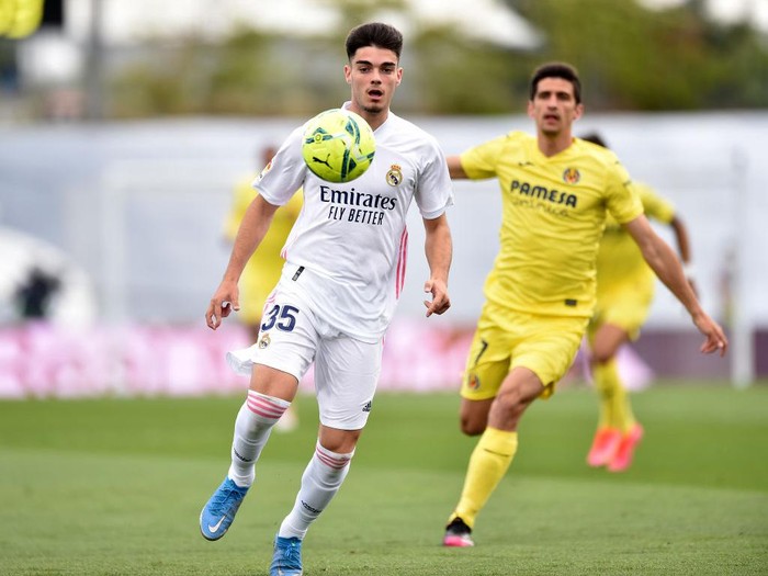 MADRID, SPAIN - MAY 22: Miguel Gutierrez of Real Madrid on the ball during the La Liga Santander match between Real Madrid and Villarreal CF at Estadio Santiago Bernabeu on May 22, 2021 in Madrid, Spain. Sporting stadiums around Spain remain under strict restrictions due to the Coronavirus Pandemic as Government social distancing laws prohibit fans inside venues resulting in games being played behind closed doors (Photo by Denis Doyle/Getty Images)