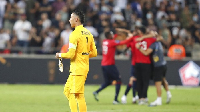 PSGs goalkeeper Keylor Navas walks at the end of the French Super Cup final soccer match between Lille and Paris Saint-Germain at Bloomfield Stadium in Tel Aviv, Israel, Sunday, Aug. 1, 2021. (AP Photo/Ariel Schalit)
