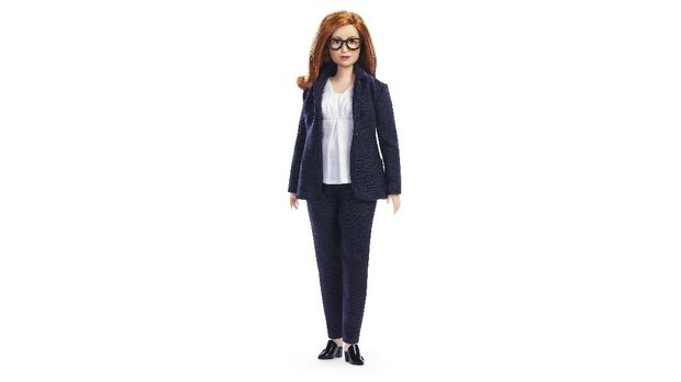 In this undated photo issued by Mattel, a view of the Barbie doll made in the image of British Professor Sarah Gilbert, in honour of the Oxford vaccine co-creator. The toy company has created models in honour of five other women working in STEM around the world. (Andy Paradise/Mattel via AP)