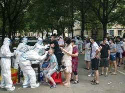 Wuhan Tes Corona 11 Juta Warga dalam 5 Hari, AS Catat 118.000 Kasus Sehari