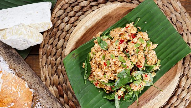 Sambel tempe or sambal tempeh is traditional indonesian culinary food made from crushed fried tempeh, grated coconut, mlanding and basil leaf.