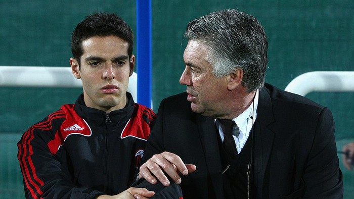 Kaka DUBAI, UNITED ARAB EMIRATES - JANUARY 06: Kaka (L) of AC Milan speaks with Carlo Ancelotti (R), manager of AC Milan before the Dubai Football Challenge match between AC Milan and Hamburger SV at The Emirates Sevens Stadium on January 6, 2009 in Dubai, United Arab Emirates. (Photo by Ryan Pierse/Getty Images)