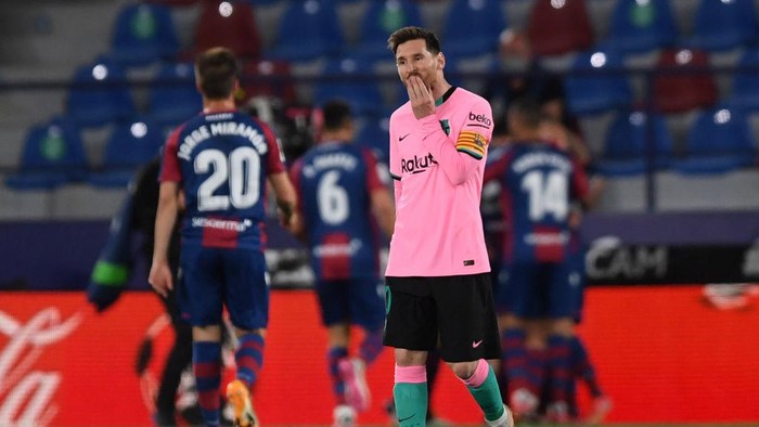 VALENCIA, SPAIN - MAY 11: Lionel Messi of Barcelona reacts after José Luis Morales Nogales of Levante UDs goal during the La Liga Santander match between Levante UD and FC Barcelona at Ciutat de Valencia Stadium on May 11, 2021 in Valencia, Spain. Sporting stadiums around Spain remain under strict restrictions due to the Coronavirus Pandemic as Government social distancing laws prohibit fans inside venues resulting in games being played behind closed doors. (Photo by Alex Caparros/Getty Images)