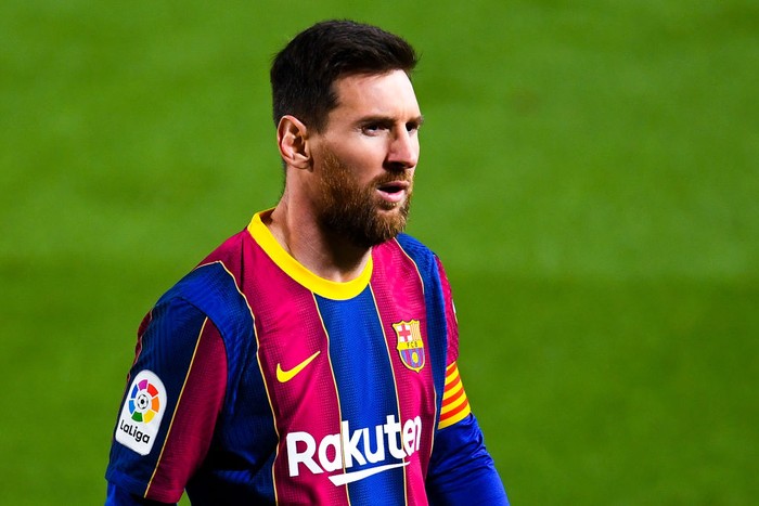 BARCELONA, SPAIN - MARCH 15: Lionel Messi of FC Barcelona looks on during the La Liga Santander match between FC Barcelona and SD Huesca at Camp Nou on March 15, 2021 in Barcelona, Spain. Sporting stadiums around Spain remain under strict restrictions due to the Coronavirus Pandemic as Government social distancing laws prohibit fans inside venues resulting in games being played behind closed doors. (Photo by David Ramos/Getty Images)