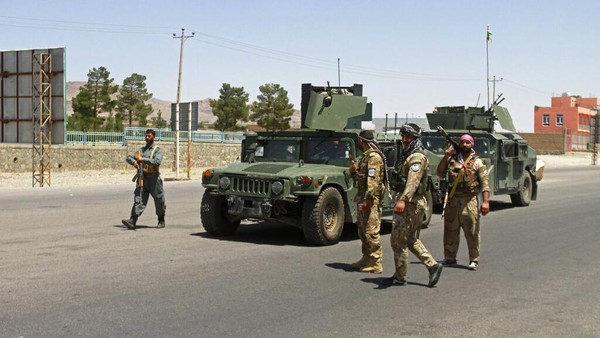 Afghans flees fighting between Taliban and Afghan security forces, on the outskirts of Herat, 640 kilometers (397 miles) west of Kabul, Afghanistan, Sunday, Aug. 8, 2021. (AP Photo/Hamed Sarfarazi)