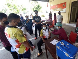 Belasan Atlet Difabel Ikuti Vaksinasi di Mapolresta Solo