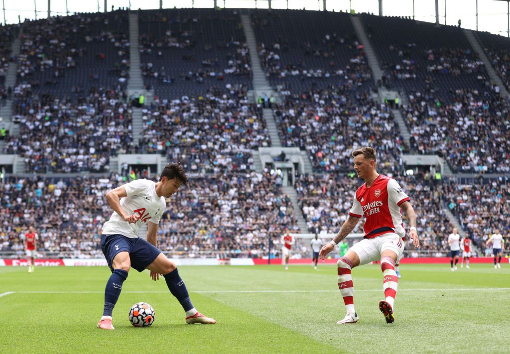 LONDON, ENGLAND - AUGUST 08: Son Heung-min of Tottenham Hotspur and Ben White of Arsenal  during the Pre-season friendly between Tottenham Hotspur and Arsenal at Tottenham Hotspur Stadium on August 08, 2021 in London, England. (Photo by Catherine Ivill/Getty Images)