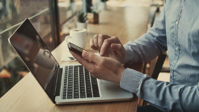 social media, closeup of hands holding smartphone in cafe, banking online, businessman with mobile internet