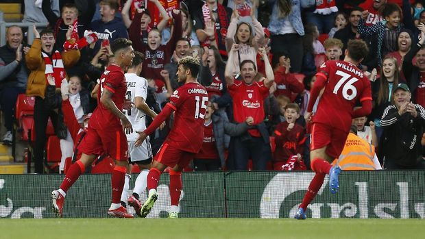 Soccer Football - Pre Season Friendly - Liverpool v Osasuna - Anfield, Liverpool, Britain - August 9, 2021 Liverpool's Roberto Firmino celebrates scoring their third goal with teammates Action Images via Reuters/Craig Brough