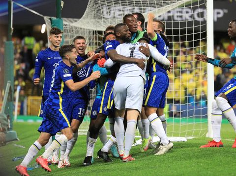 Chelsea's goalkeeper Kepa Arrizabalaga celebrates with team mates after the penalty shootout of the UEFA Super Cup soccer match between Chelsea and Villarreal at Windsor Park in Belfast, Northern Ireland, Wednesday, Aug. 11, 2021. (AP Photo/Peter Morrison)