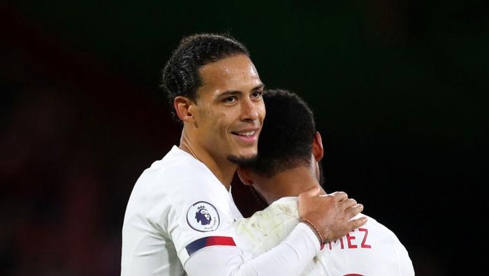 BOURNEMOUTH, ENGLAND - DECEMBER 07: Virgil van Dijk hugs Joe Gomez of Liverpool after the Premier League match between AFC Bournemouth and Liverpool FC at Vitality Stadium on December 07, 2019 in Bournemouth, United Kingdom. (Photo by Catherine Ivill/Getty Images)