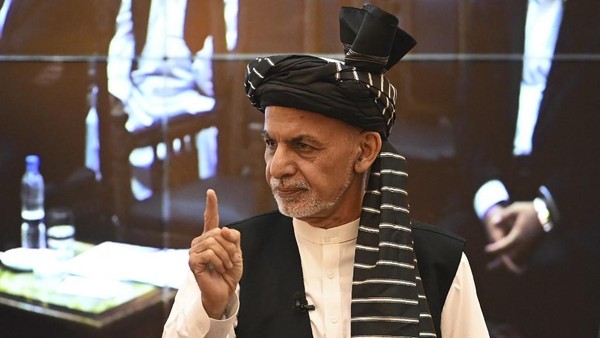 Afghanistans President Ashraf Ghani gestures during a function at the Afghan presidential palace in Kabul on August 4, 2021. (Photo by SAJJAD HUSSAIN / AFP)